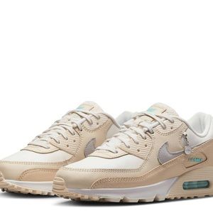 Women’s Nike air max 90 trainers in off white and silver